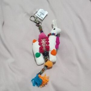 Cost Plus World Market White and Pink Bag Charm with Plush Figure